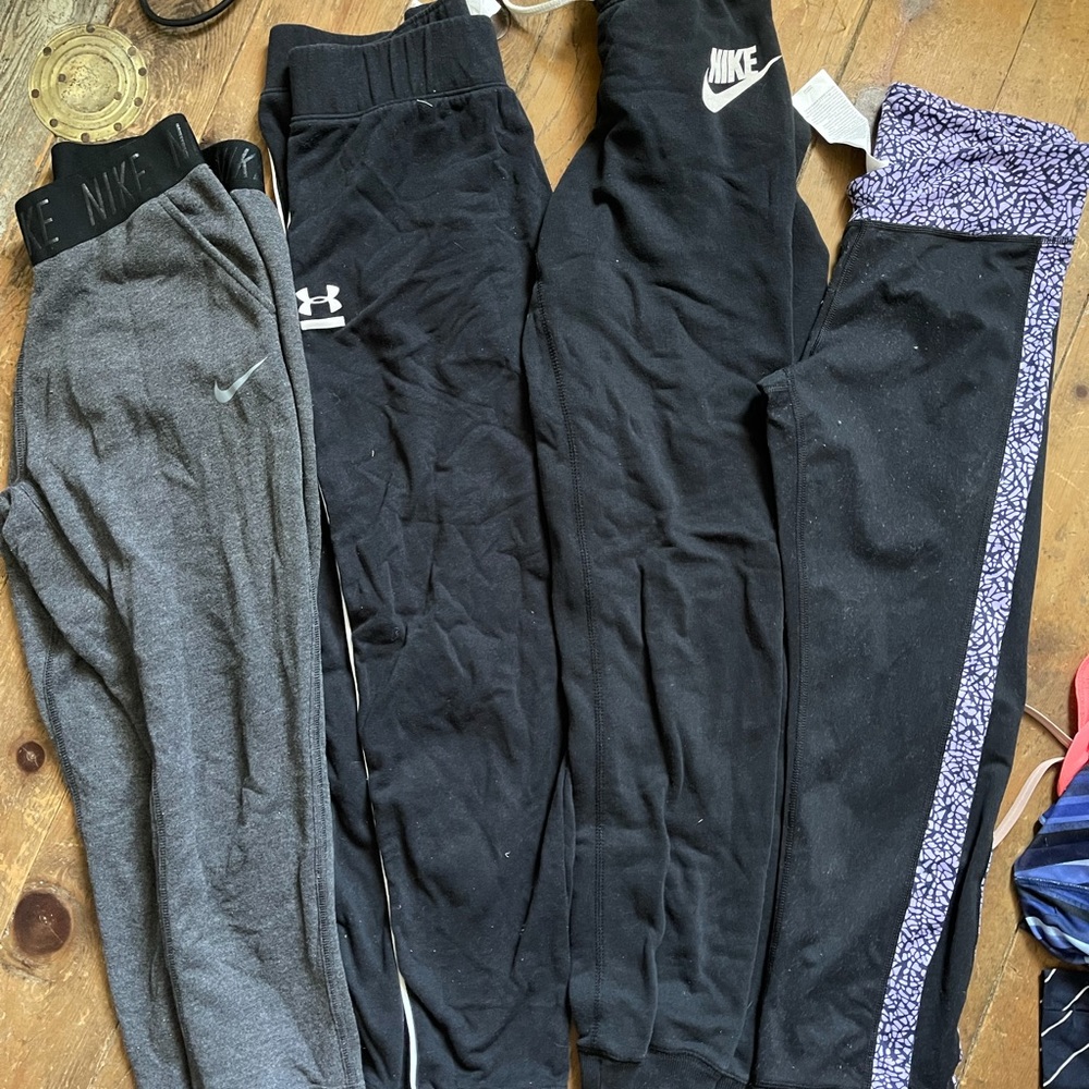 Nike and under armour sweatpants and Capri sweats.
